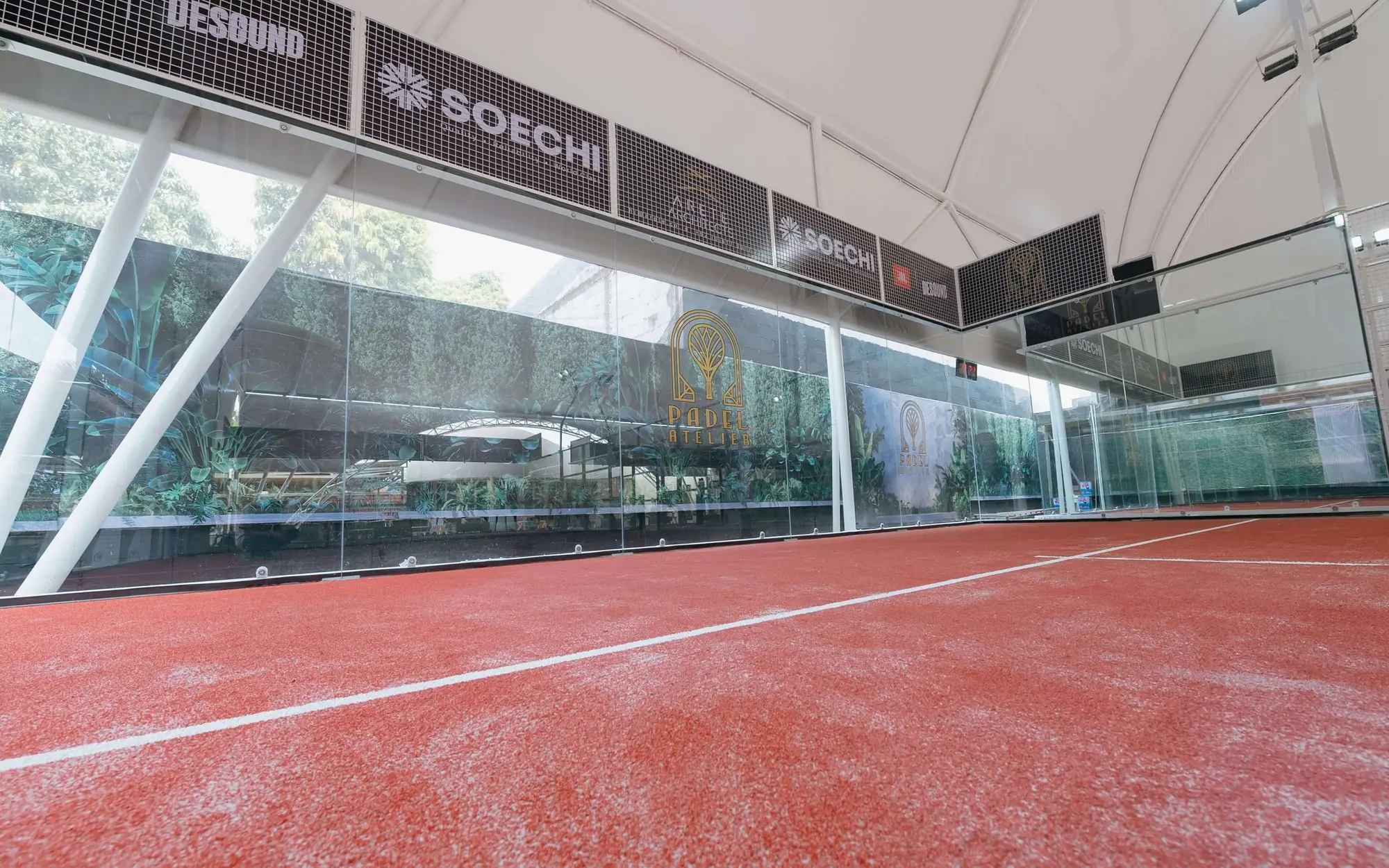 Panoramic court with glass walls and sponsor boards